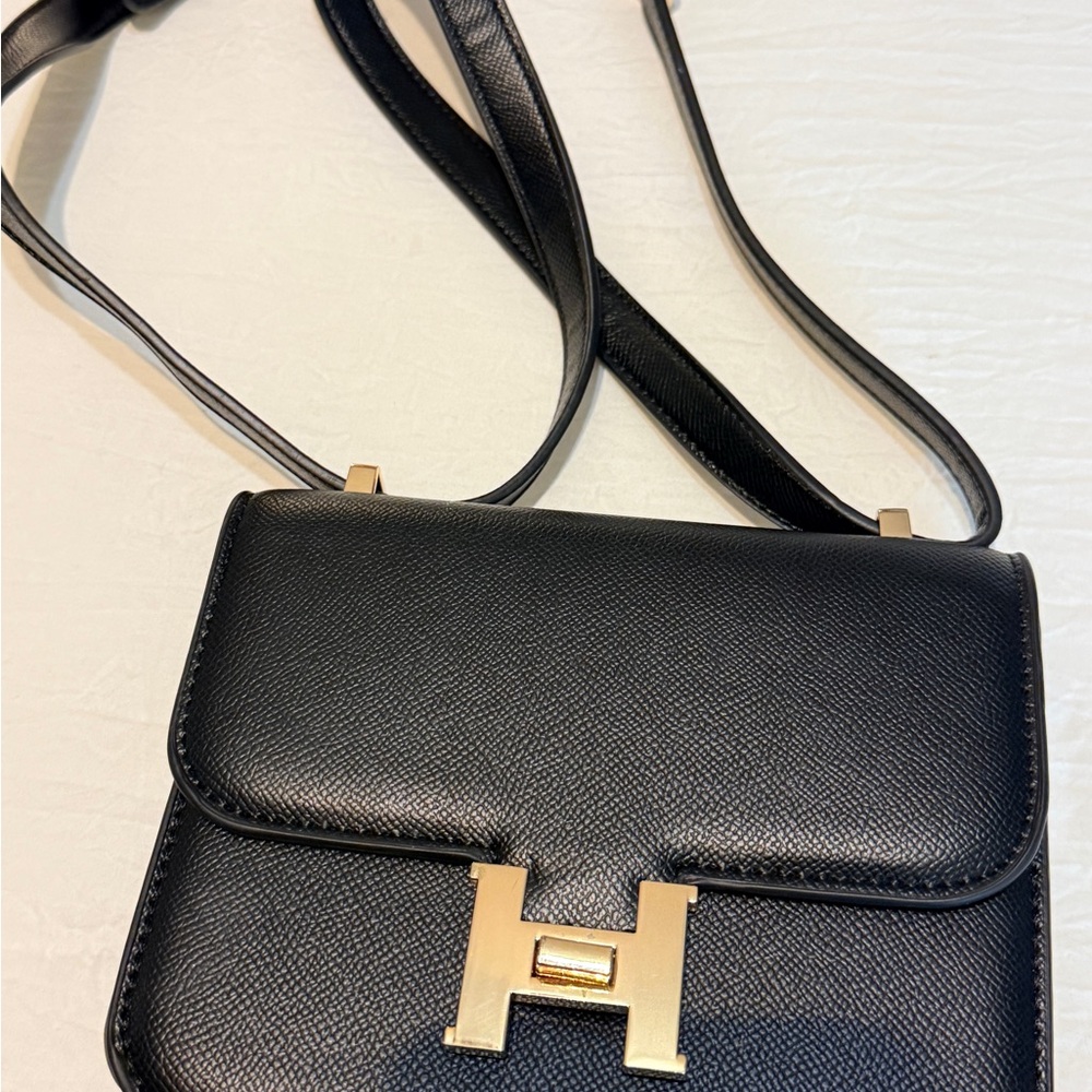 Chic Black Crossbody Bag with Gold Accents